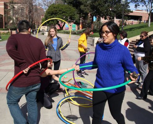 a picture of health people with hula hoops