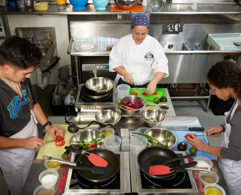 Chef Julia, here teaching the art of good guac, says in her prior career she used to constantly fret about her students. “I couldn’t stop worrying,” she recalls. “Were they getting enough to eat?”