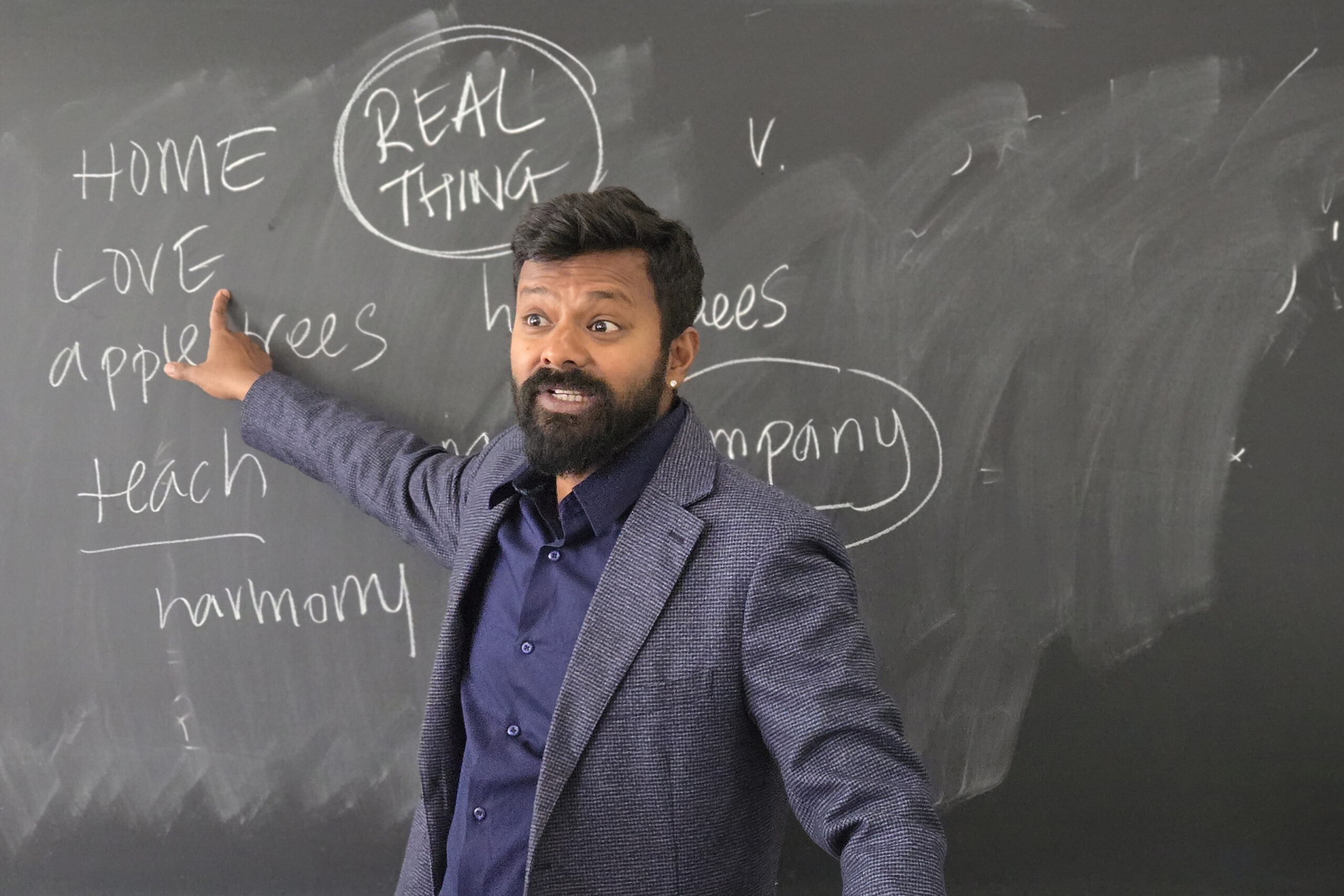 Professor Vetri at the chalkboard for discussion.